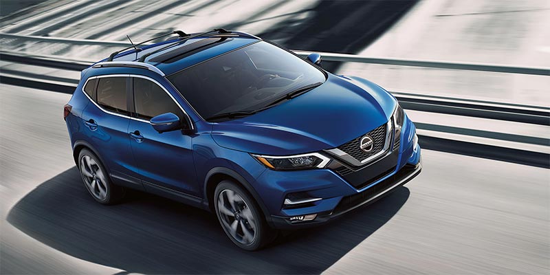 Nissan Rogue SUV driving on a multi-lane highway